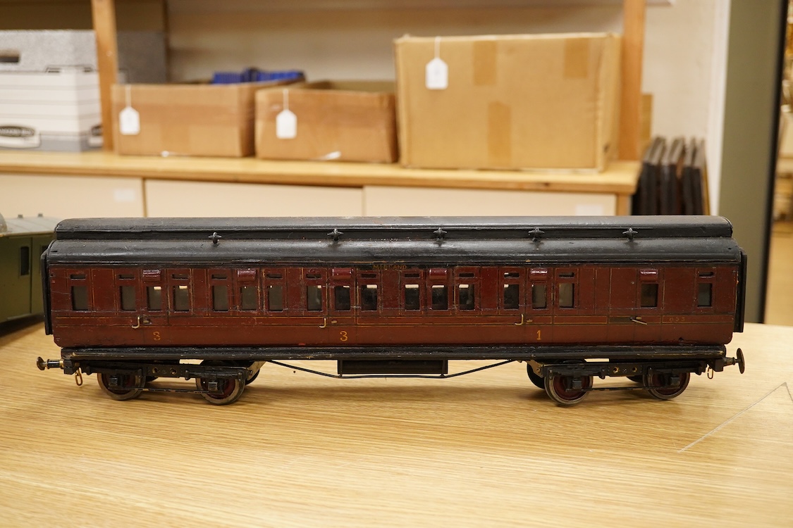 Two Gauge One bogie coaches; a Midland Railway clerestory coach, together with a 12-wheel Pullman car (bogies af), plus an American outline caboose, some scratch building and adaptation from kits, etc.